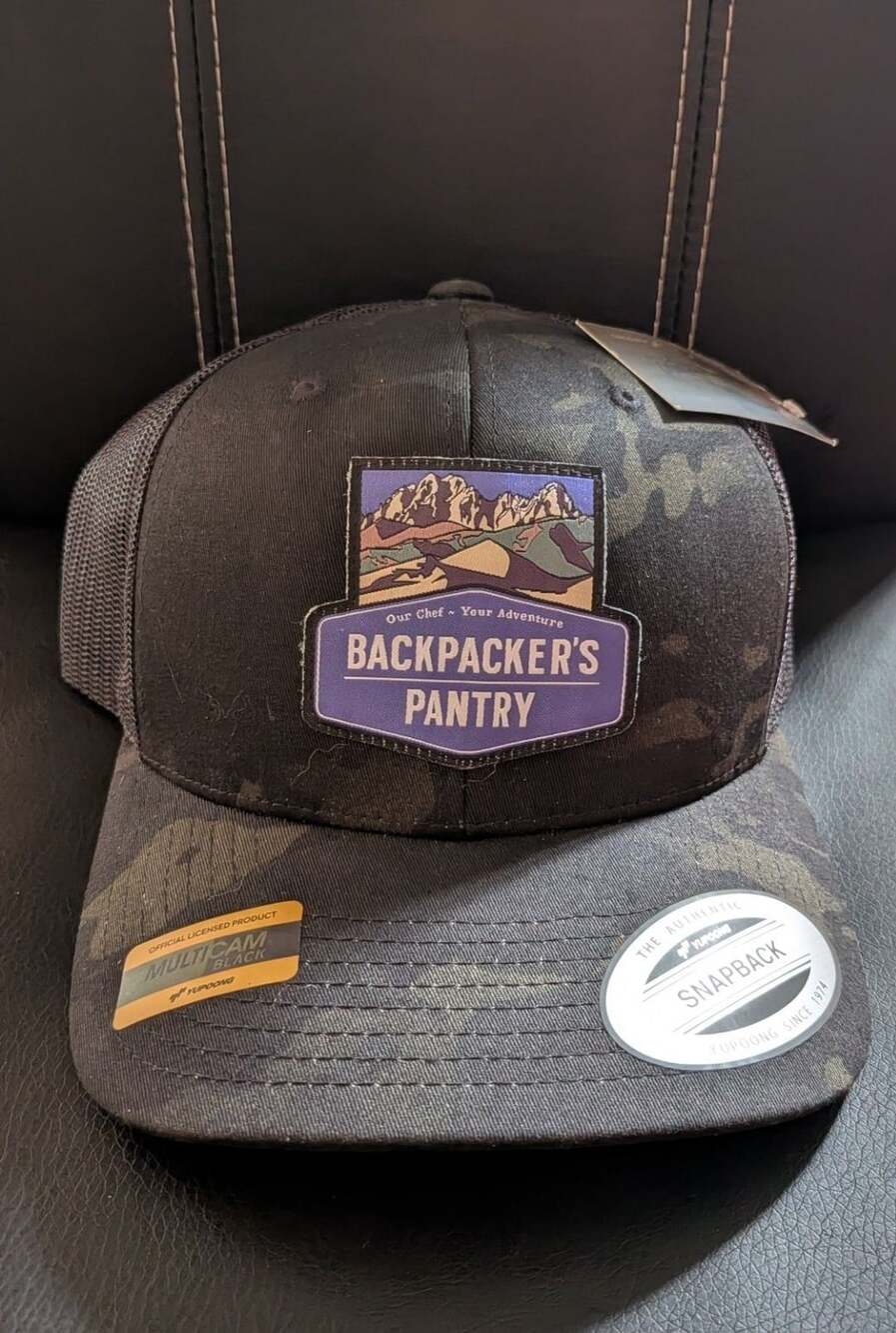 Backpacker's Pantry Multicam Black Snapback Trucker Hat Yupoong The Classics